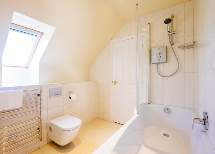 The bathroom in Ross, a Highcliffe Holidays cottage in Polzeath, Cornwall.